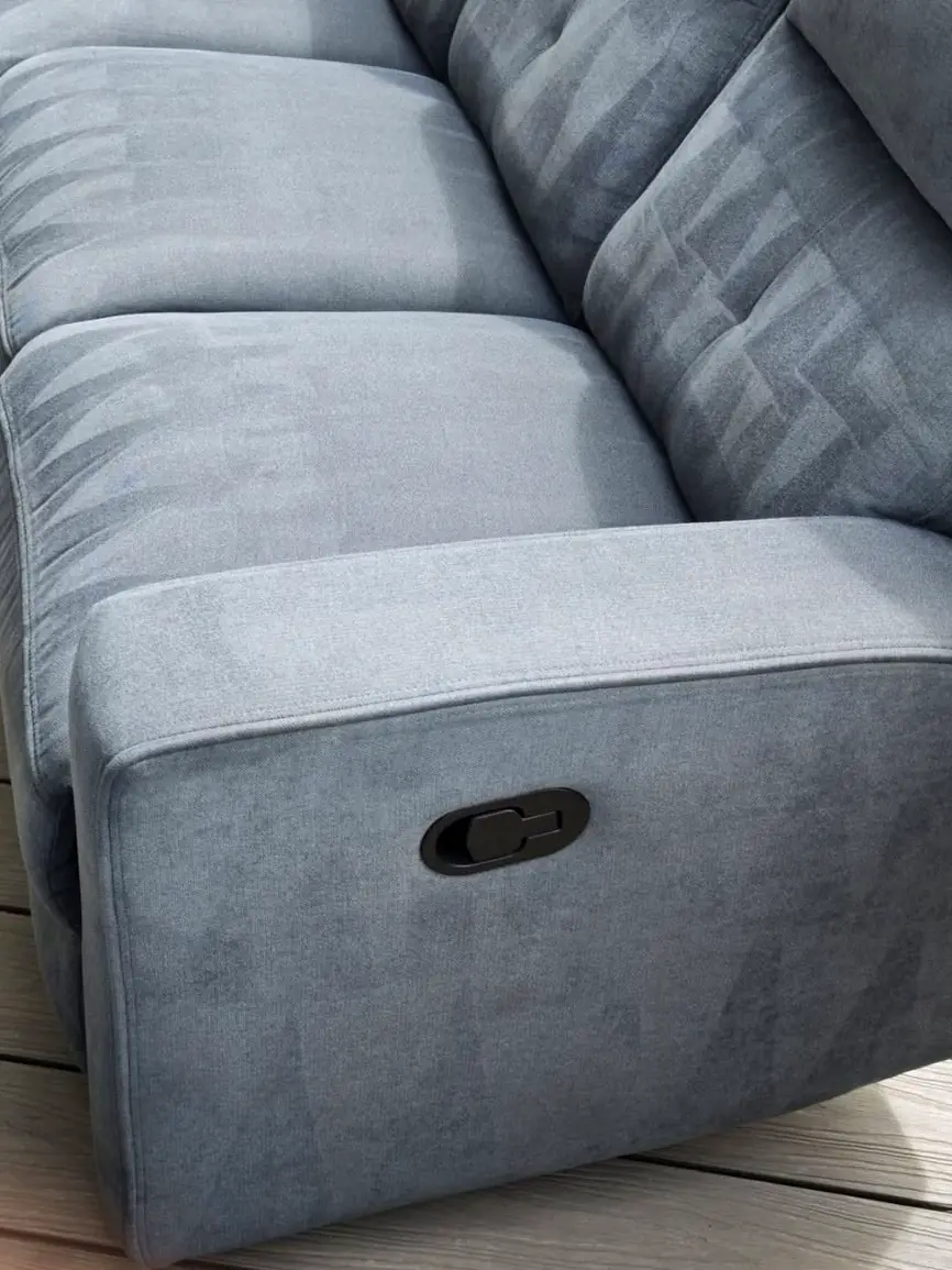 Grey fabric recliner sofa after upholstery cleaning