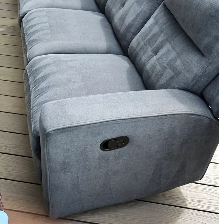 The same grey fabric recliner sofa after upholstery cleaning