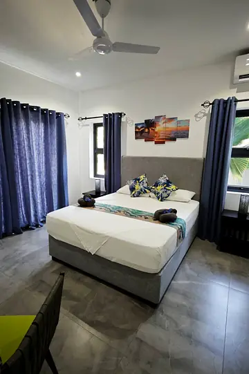Holiday-rental bedroom after cleaning