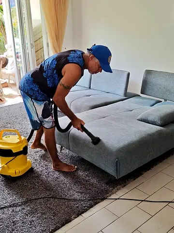 Sofa upholstery cleaning in progress